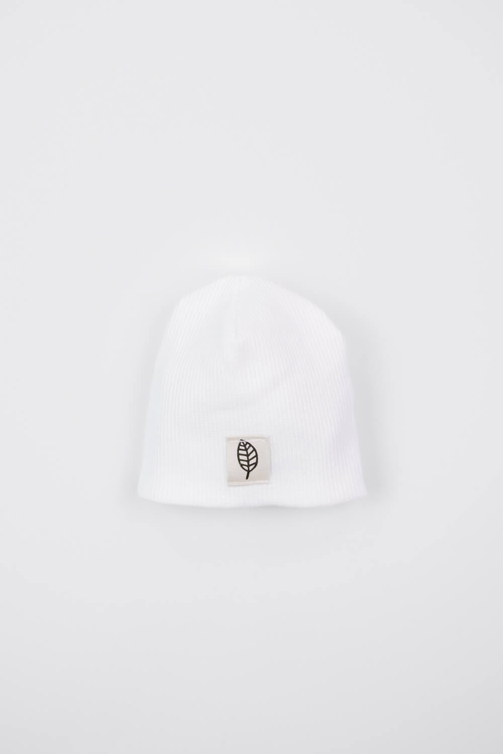 Prematuur muts met logo wit