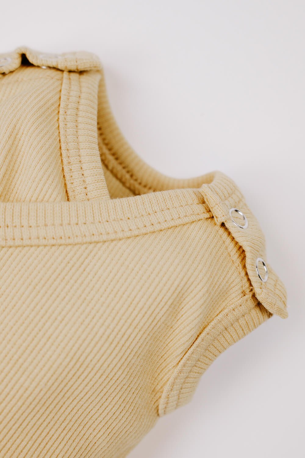 Prematuur romper detail rib zacht geel